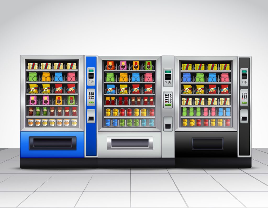 Three vending machines filled with snacks and beverages